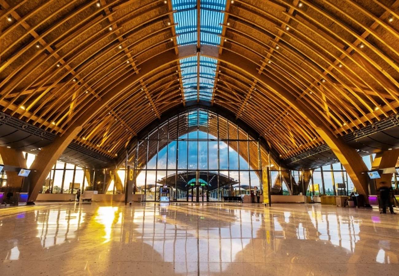 Mactan-Cebu International Airport Terminal 2 timber glulam arch departure hall under Aboitiz InfraCapital public-private partnership