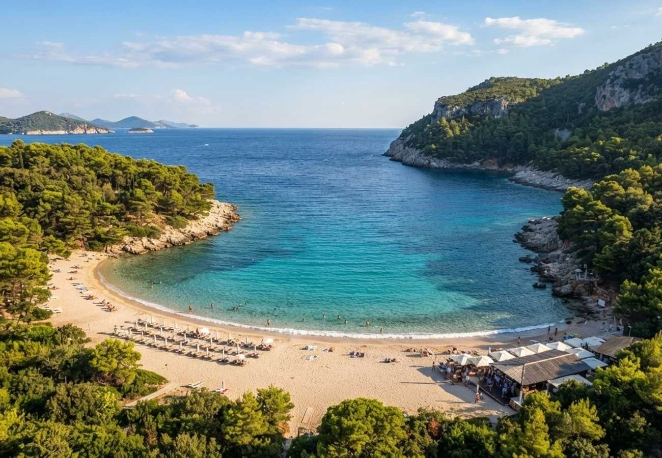 Panoramic view of the sandy Šunj Beach and turquoise waters on Lopud Island