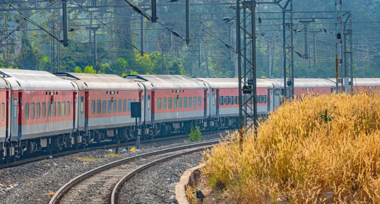 Indian Railways express train navigating cross-border route toward Nepal border