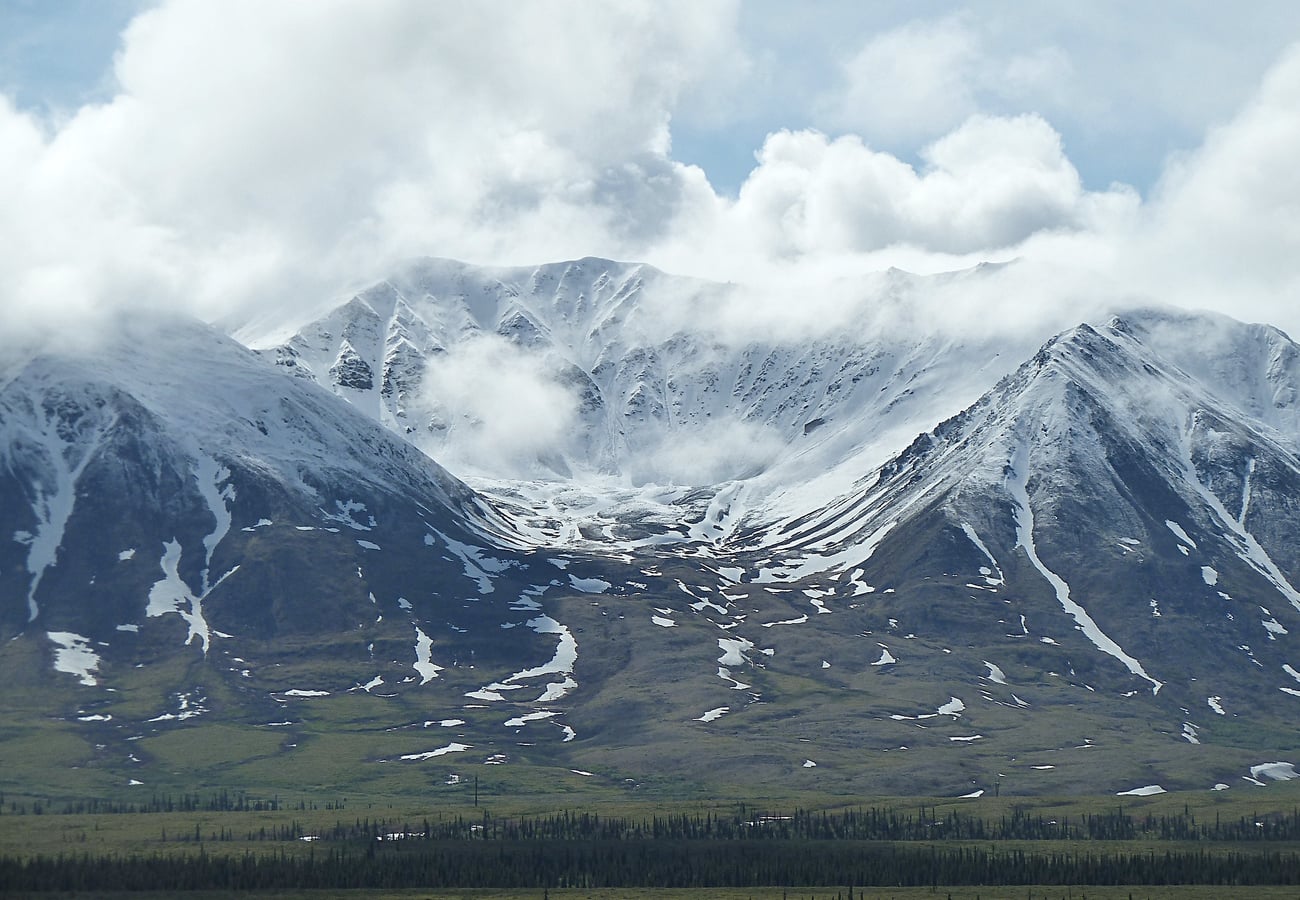 Snow-draped Alaska Range dominating the horizon along the George Parks Highway