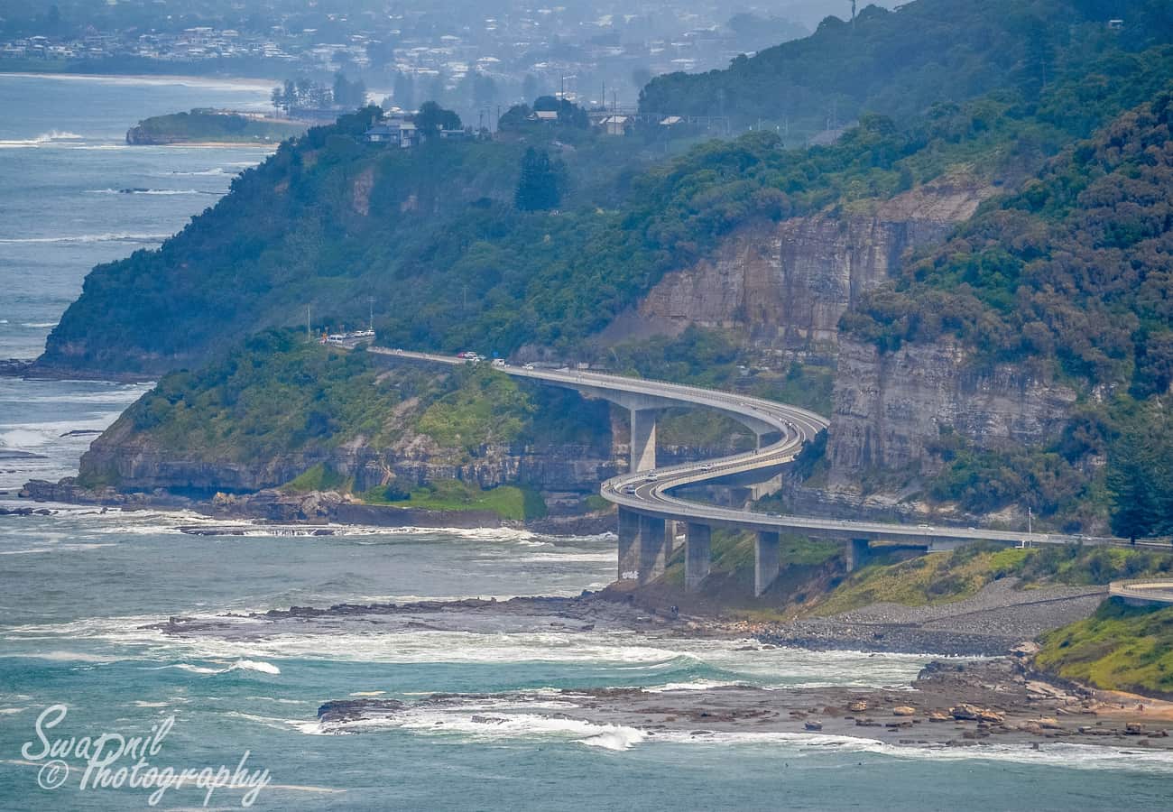 Sea Cliff Bridge cantilevering above the crashing Pacific Ocean in New South Wales