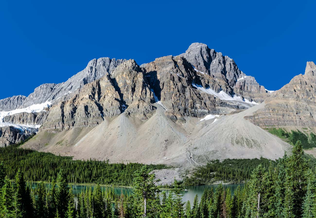 Bow Lake crystal-clear shoreline looking toward Crowfoot Mountain and the Bow Glacier headwaters