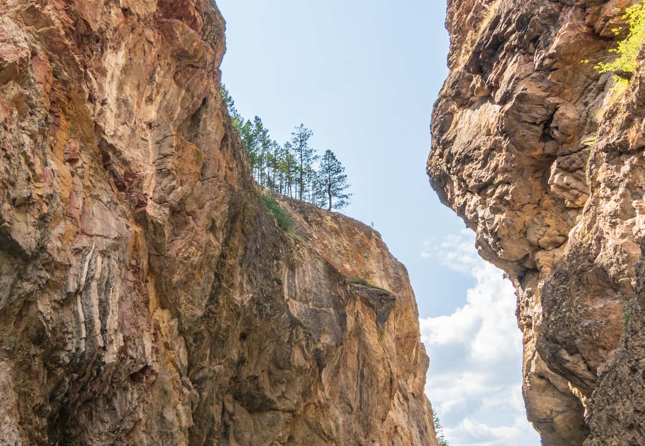 The sheer limestone cliffs of Sinclair Canyon greeting motorists at Radium Hot Springs