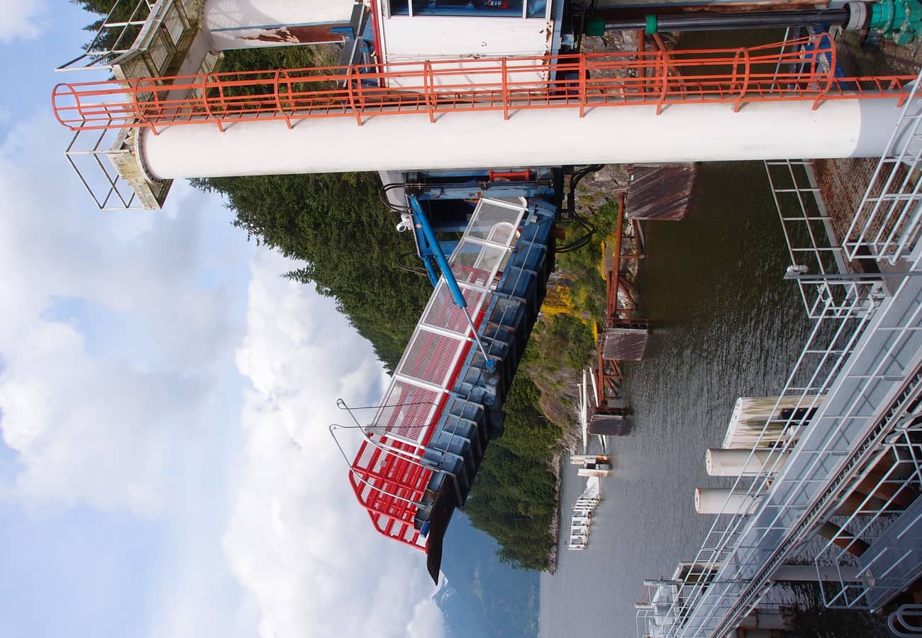 A BC Ferry navigating coastal fjords into Horseshoe Bay terminal on the approach to Vancouver