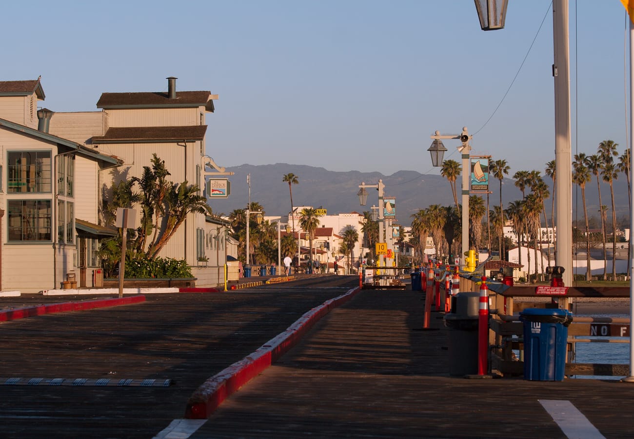 Historic Stearns Wharf wooden pier extending into the harbor in Santa Barbara California