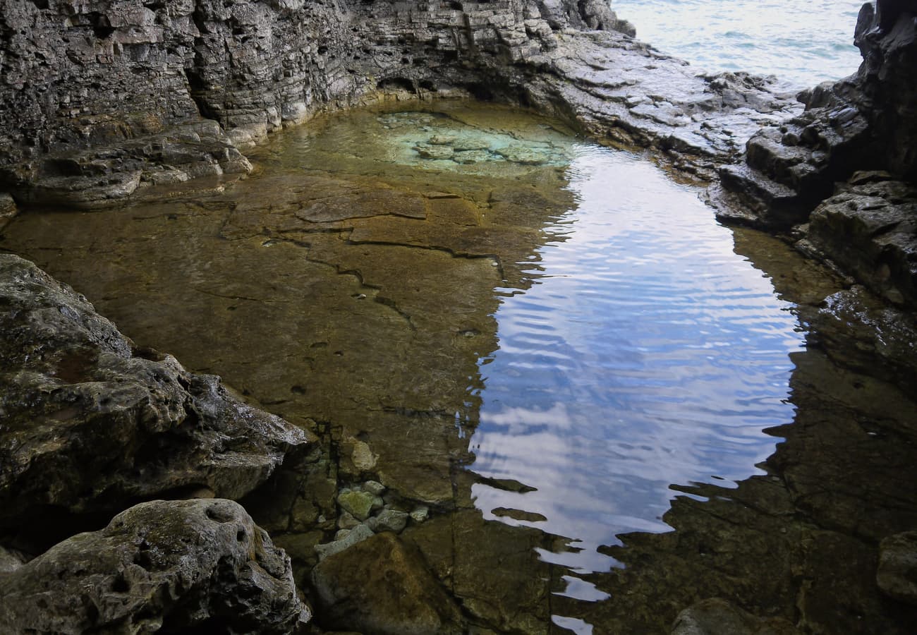 Azure crystalline limestone grotto in Bruce Peninsula National Park