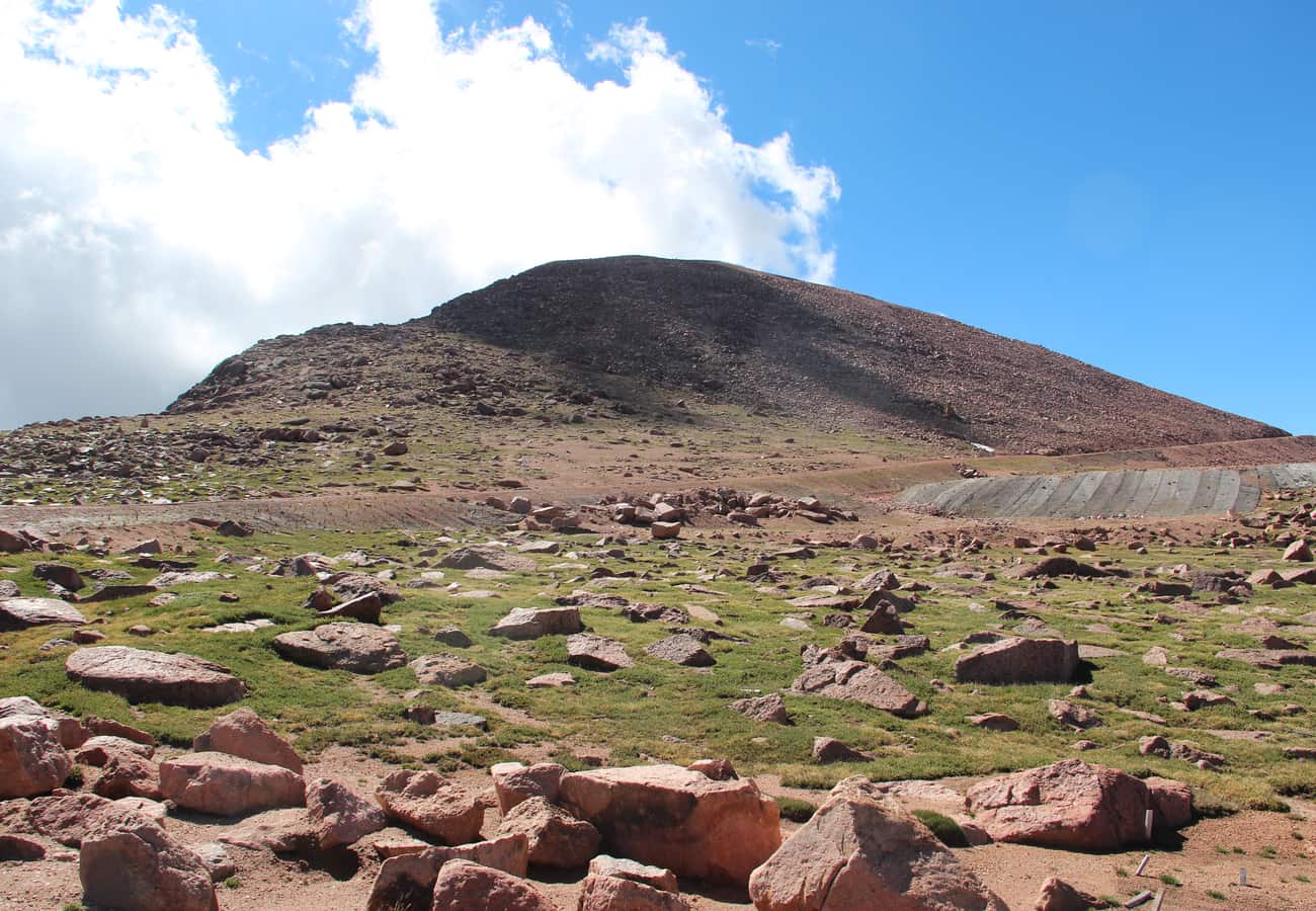 Pikes Peak summit viewed from the winding hairpin curves of the Pikes Peak Highway
