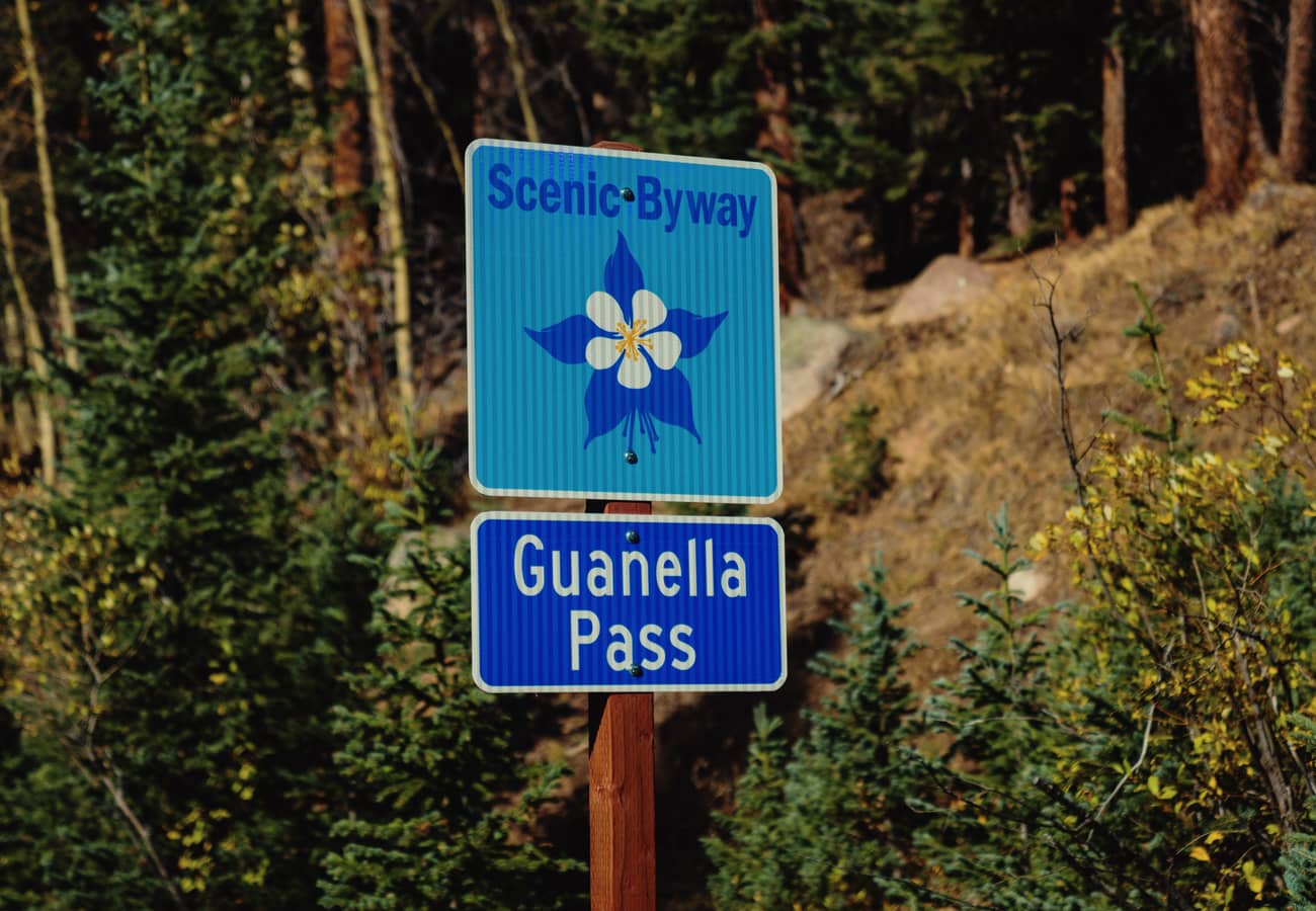 Guanella Pass Scenic Byway climbing through alpine wetlands beneath Mount Bierstadt