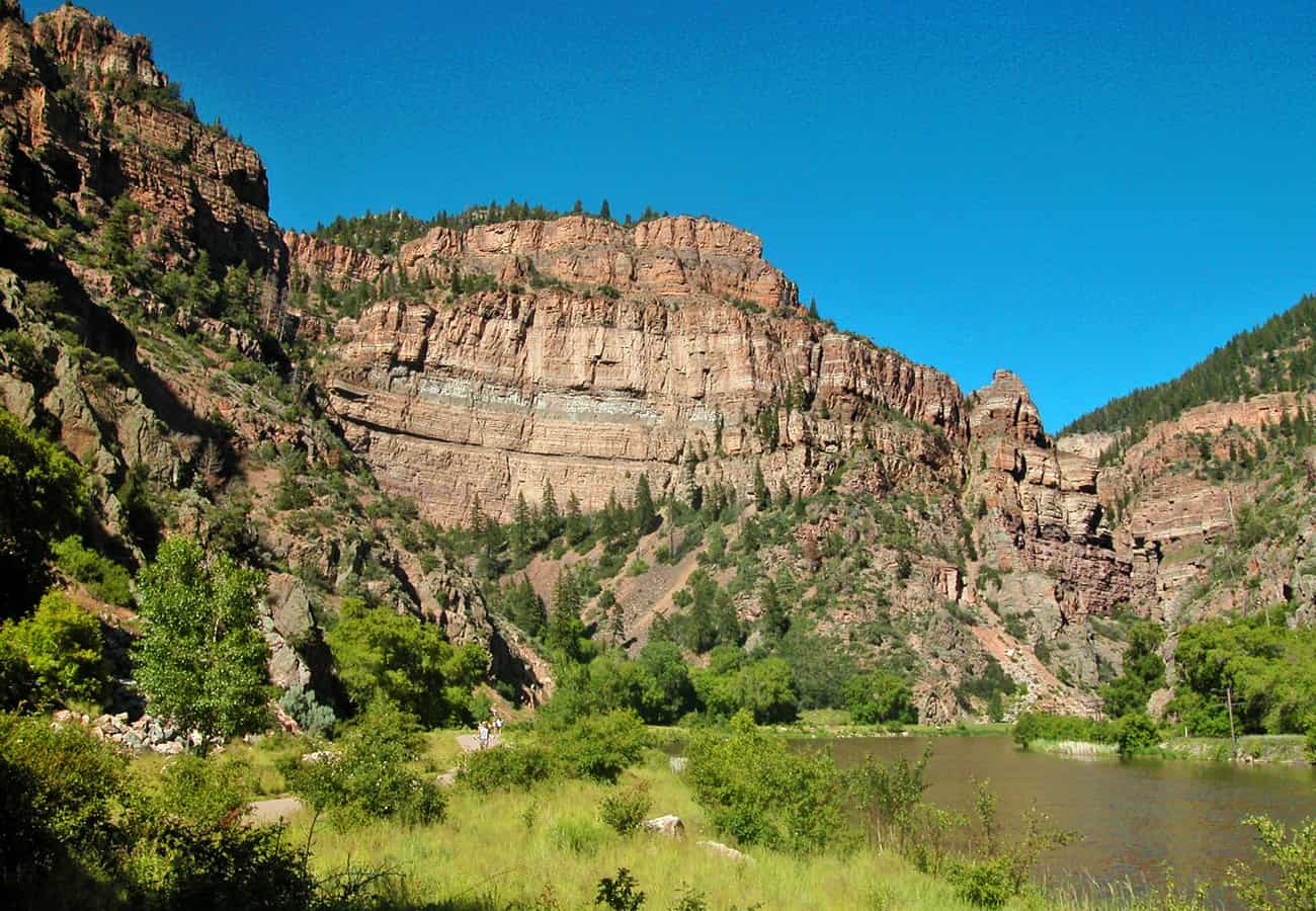 Interstate 70 viaduct following the Colorado River through the towering depths of Glenwood Canyon