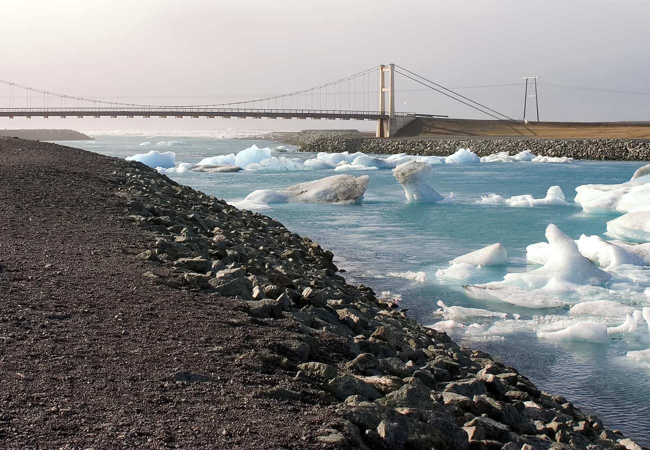 Vivid blue icebergs floating in the still waters of Jökulsárlón Glacier Lagoon