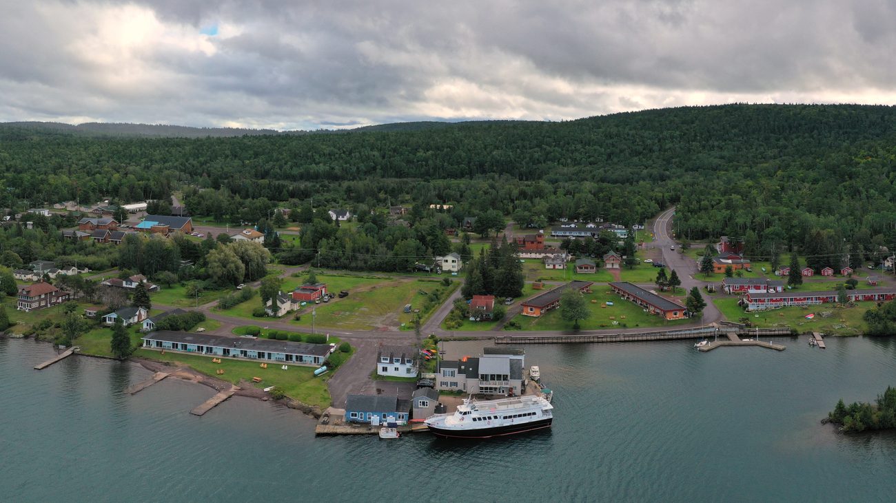Aerial panorama of Copper Harbor village and sheltered harbor basin on Lake Superior