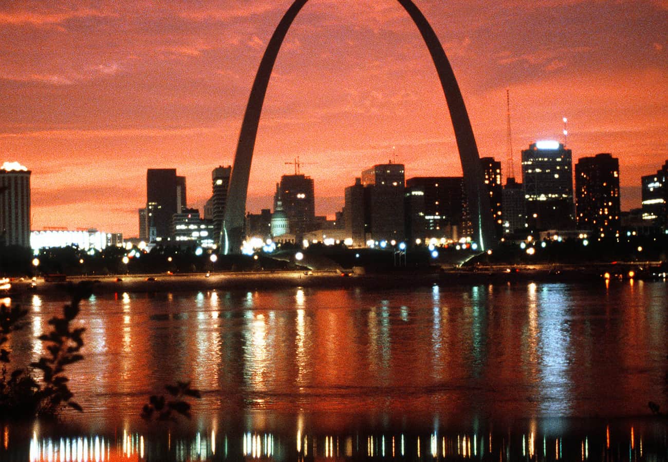 Gateway Arch and illuminated night skyline of St Louis Missouri