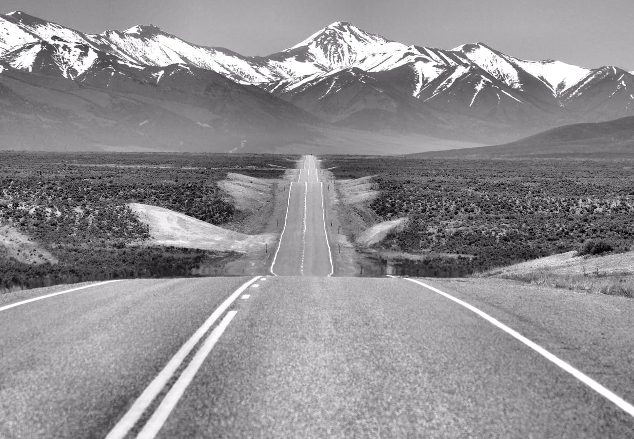 US Route 50 cutting straight across the open high desert of Nevada