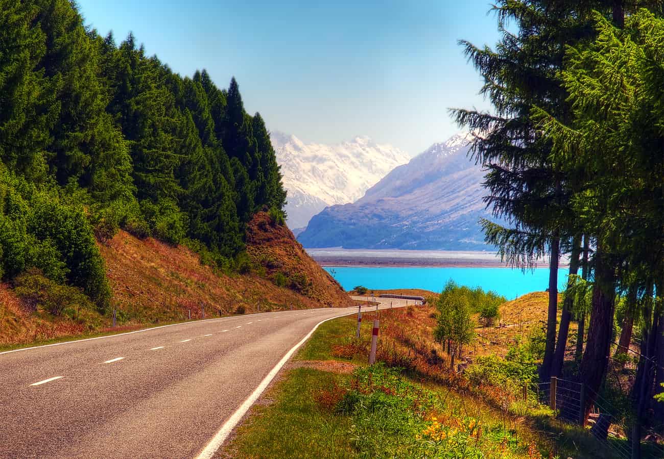 Vivid turquoise waters of Lake Pukaki framing the snowfields of Mount Cook