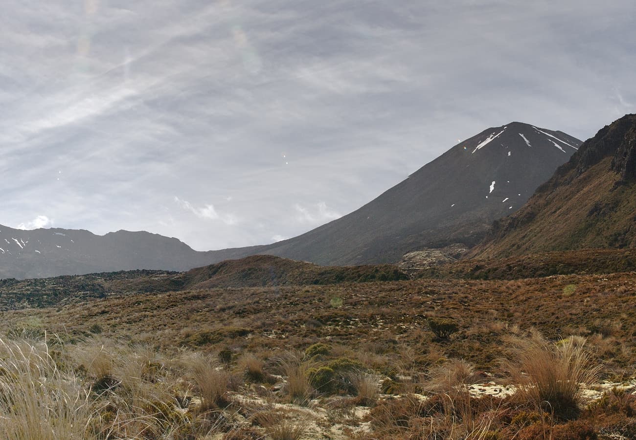 Snow-capped volcanic cones of Mount Tongariro and Mount Ngauruhoe