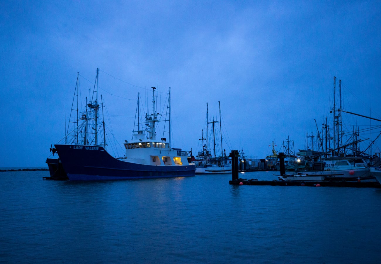 Fishing vessels docked at the historic fishing wharf in Steveston Village Richmond