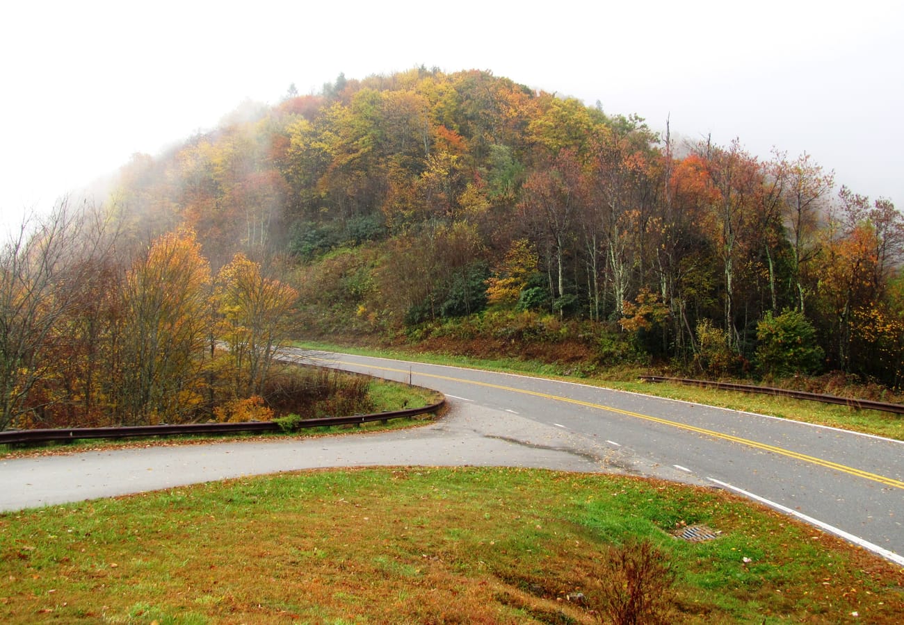 Cherohala Skyway panoramic ridge overlook with autumn colors across the Unicoi Mountains