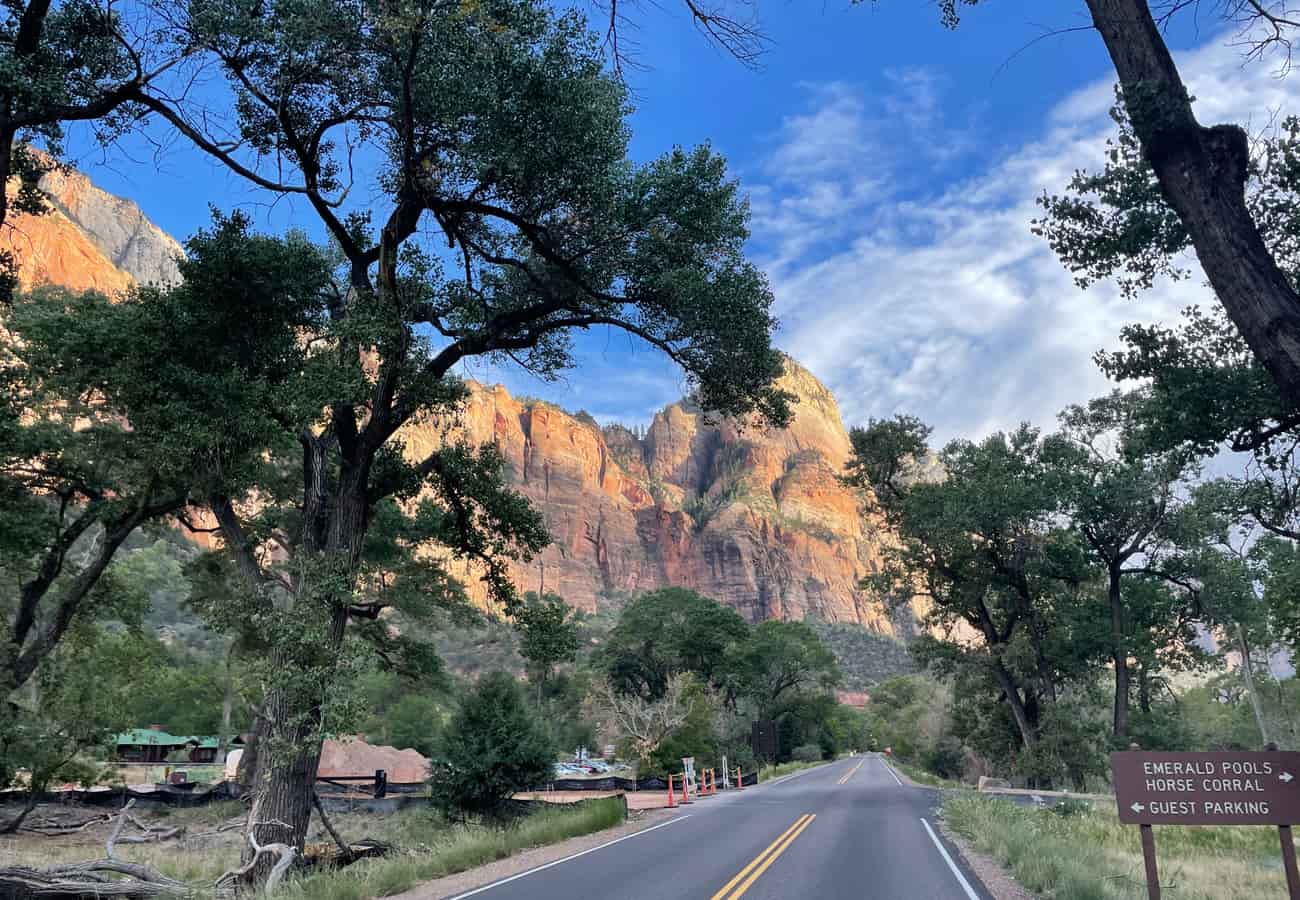 Zion Canyon Scenic Drive flanked by sheer red and white Navajo sandstone cliffs
