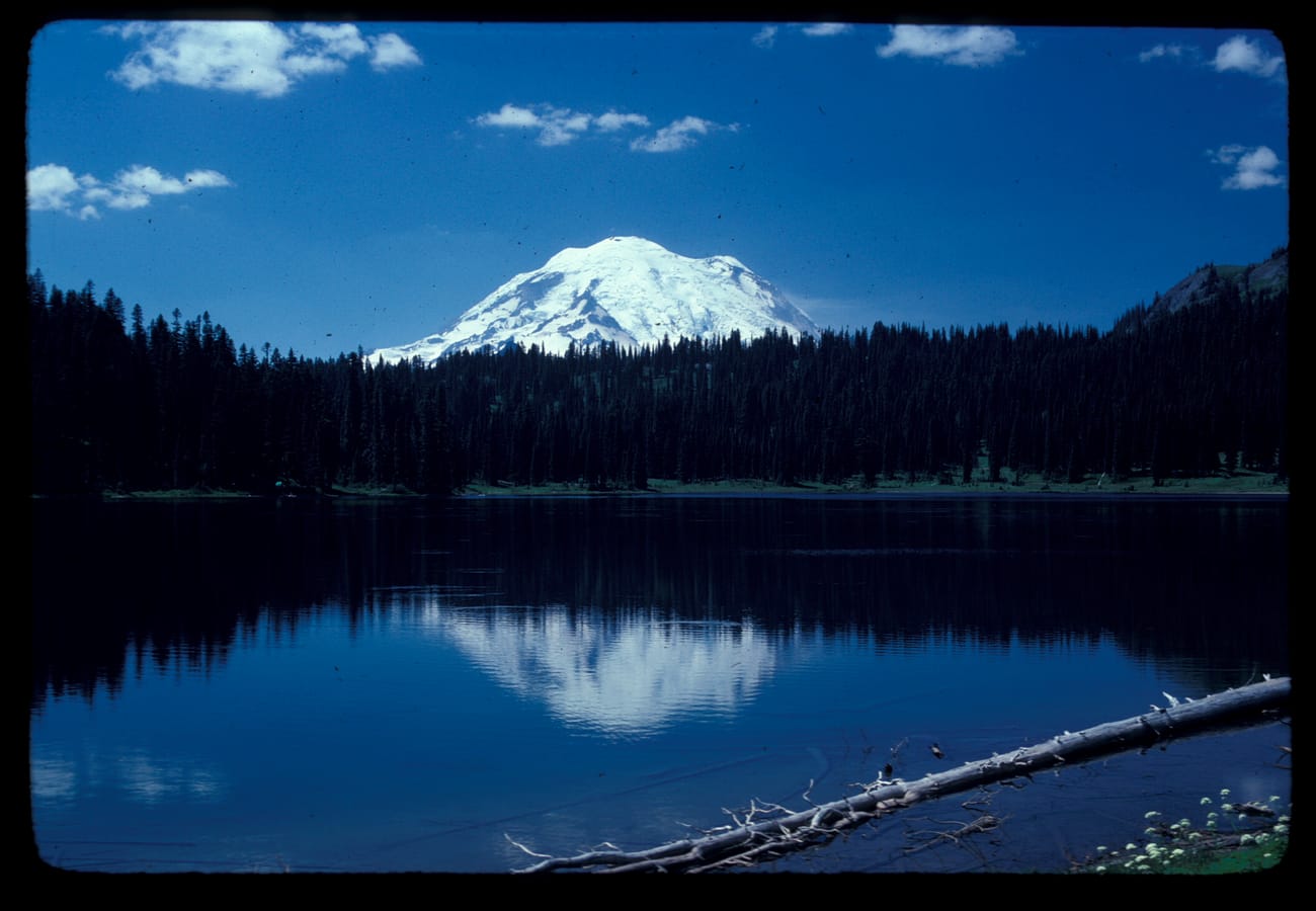 Mount Rainier reflecting in the still alpine waters of Reflection Lake