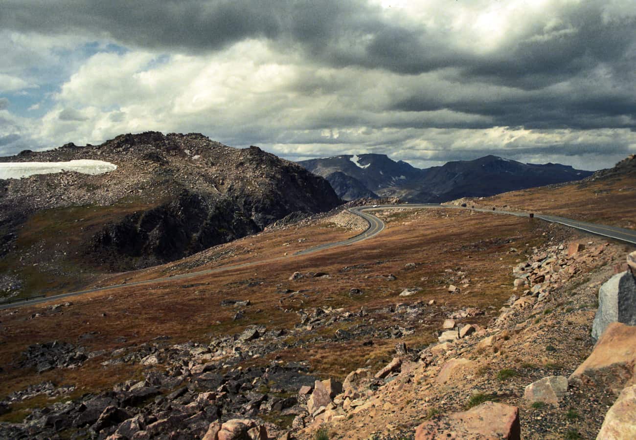 High alpine highway winding over Beartooth Pass at 10,940 feet elevation