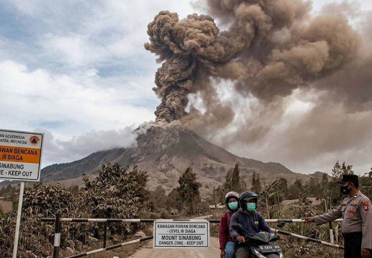 Volcanic ash plume rising from Mount Sinabung in North Sumatra