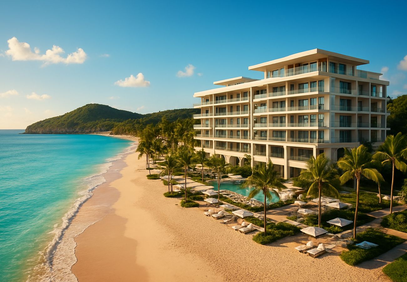 Aerial view of Nikki Beach Residences on Jolly Beach, Antigua with turquoise waters and white sandy shores